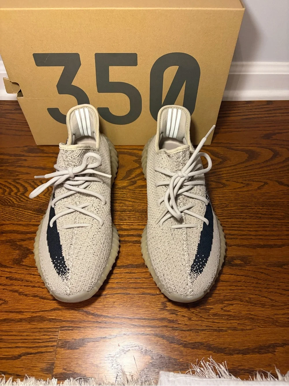Yeezy Cream and Black Stripe Sneakers